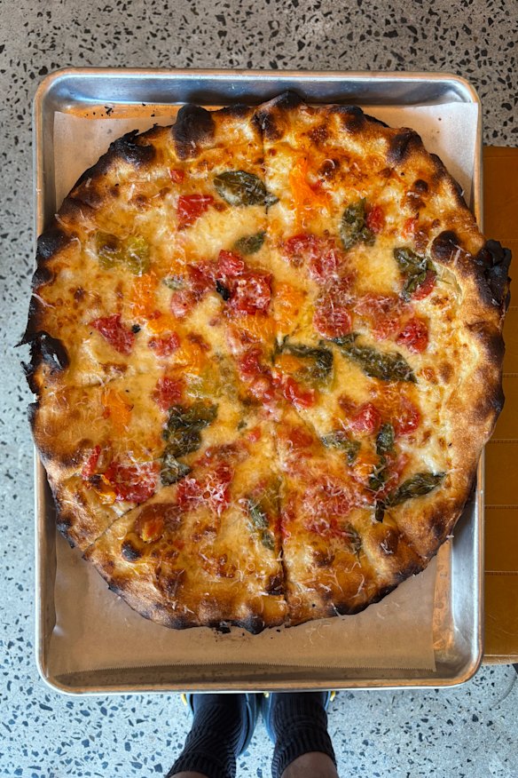 Mozzarella, tomato, basil, garlic, olive oil and pecorino.