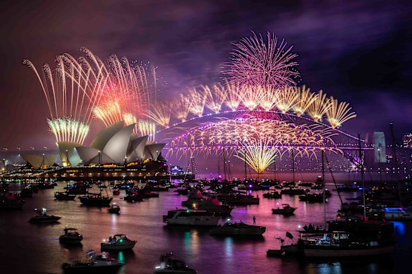 The harbour illuminates welcoming in the new year.