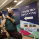 Heart transplant patient Moshe Geva Rosso receives a fourth dose of the COVID vaccine in Ramat Gan, Israel. 