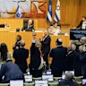 Israeli Minister of National Security, Itamar Ben-Gvir, centre, and lawmakers celebrate after Israel’s parliament passed a law approving the death penalty for Palestinians convicted of murdering Israelis on Momday.