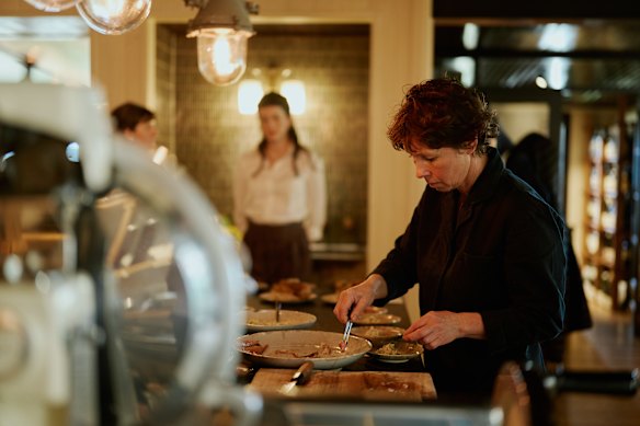 Chef Brigitte Hafner plating up.
