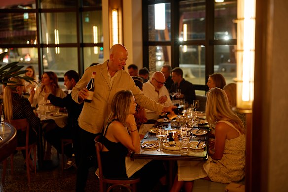 The restaurant sits on a sweeping corner of the hotel’s ground floor.