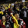 Twins fans cheer during the Korean Series Game Five between LG Twins and KT Wiz at Jamsil Stadium.