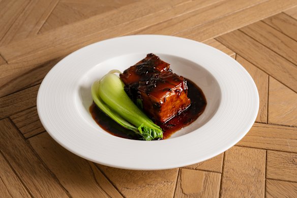 Red-braised Kurobuta pork belly with Asian greens.