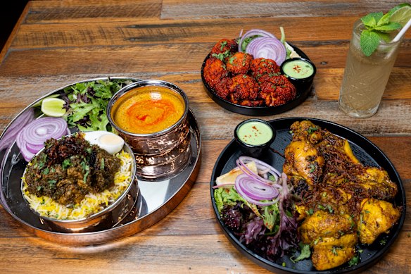 Gongura chicken biryani, dhabha chicken tikka, achari gobi tikka (red) and masala soda drink.