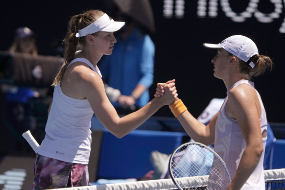 Elena Rybakina, left, of Kazakhstan, left, is congratulated by Iga Swiatek of Poland after their fourth round clash.