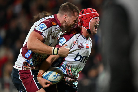 Harry Wilson celebrates after scoring a try in the Reds’ win over the Crusaders.