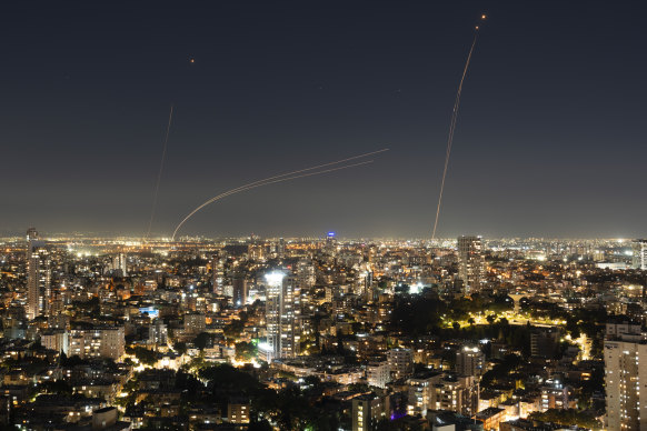 The Israeli Iron Dome air defence system fires to intercept a rocket fired from the Gaza Strip, in central Israel.