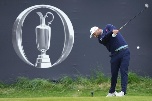 Jon Rahm tees off at the British Open.