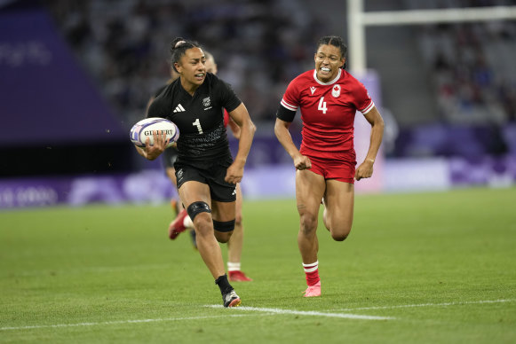 Asia Hogan-Rochester (right) in action against New Zealand during a rugby sevens pool match at the Paris Games.