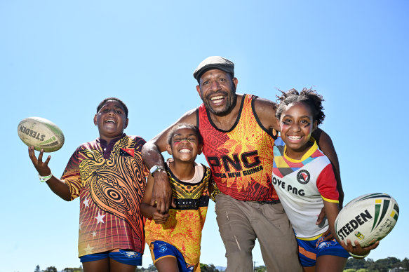 John Kewa with his children Milena (yellow top), Martina (white top) and John-Ryan.