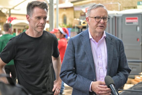 NSW Premier Chris Minns and Prime Minister Anthony Albanese at the Bill Crews Exodus foundation lunch in Ashfield on Christmas Day.