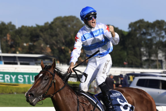 Tommy Berry stands tall in the irons after Stay Inside’s dominant win in the Golden Slipper.