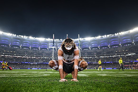 The Welcome to Country ceremony is performed during the 2025 AFL Round 11 match between Walyalup (Fremantle Dockers) and Yartapuulti (Port Adelaide Power) in Perth.