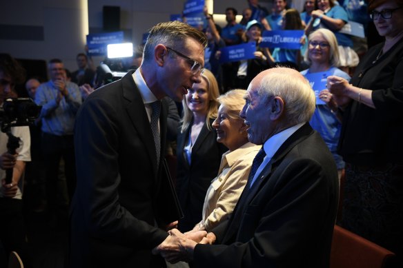 Premier Dominic Perrottet with former prime minister John Howard at the party’s campaign launch on March 12.