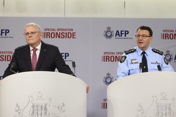 Prime Minister Scott Morrison and AFP Commissioner Reece Kershaw discuss the mass raids and arrests  following a long-running law enforcement operation.