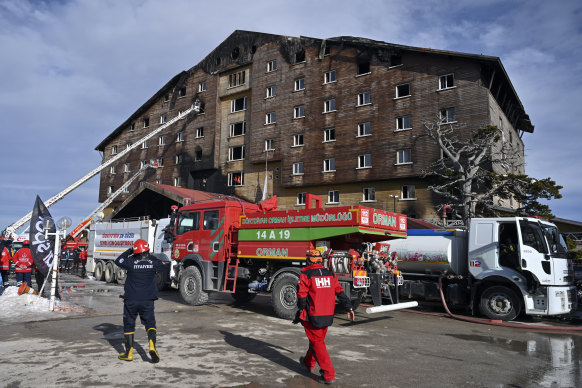 Fire engulfed the 12-storey hotel in the early hours of the morning at the start of a winter holiday period.
