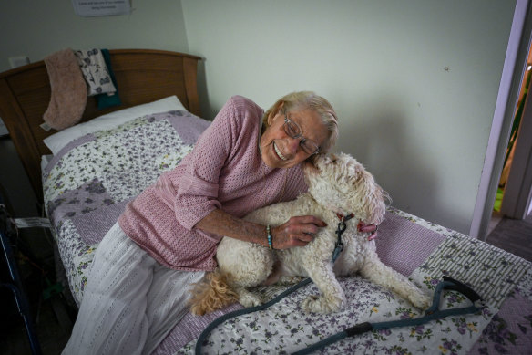 Daphne Wilson and her cavoodle Annie.