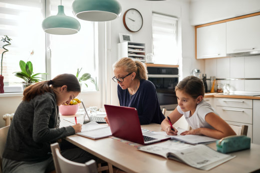 Two studies have found women juggling work and extra home duties during the pandemic are curbing careers to cope.