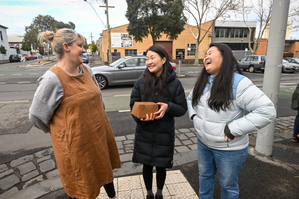 Beatrix Bakes owner Natalie Paull with customers Arielle and Andrea Kwon.