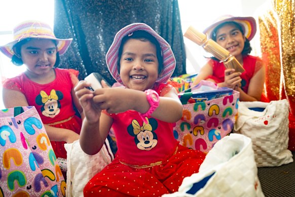 From left: Febina, Farhina and Fiona Bhuiyan at Christmas Day lunch at the Bondi Surf Bathers Life Saving Club.