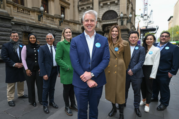 Candidates for the Arron Wood team in the City of Melbourne election: (left to right) Steve Michelson (councillor candidate),Hala Nur (councillor candidate), Nicholas Zervos (councillor candidate), Cathy Oke (councillor candidate), Arron Wood (candidate for Lord Mayor), Erin Deering (candidate for Lord Mayor), Philip Le Liu (councillor candidate), Hope Lai Wei (councillor candidate) and Michael Caiafa (councillor candidate). 