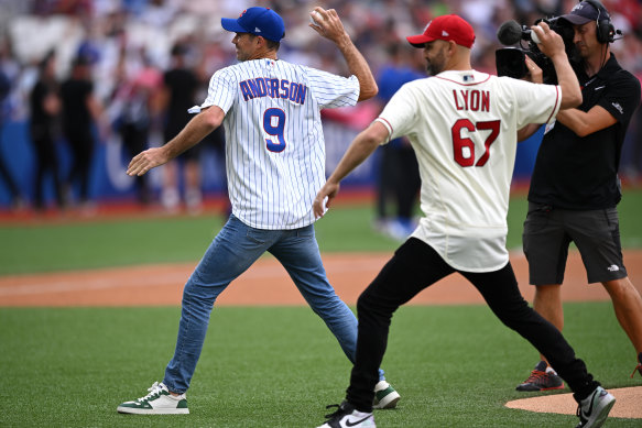 James Anderson of England and Australia’s Nathan Lyon throw ceremonial pitches ahead of the MLB London Series match between the St Louis Cardinals and Chicago Cubs on Saturday.