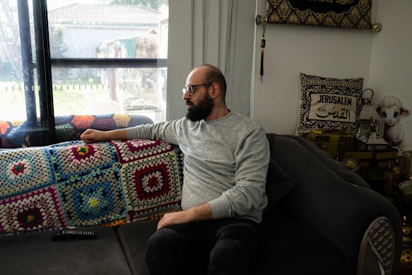 Ahmad, a refugee from Gaza, is staying with his sister while his wife and children remain trapped overseas.