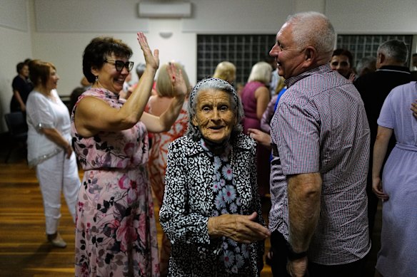 Cheers to the New Year: Srbijanka Stanisic celebrates at Holy Trinity Serbian Orthodox church hall.