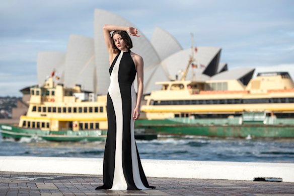 A model in Carla Zampatti before the opening show of Australian Fashion Week at Circular Quay, Sydney.