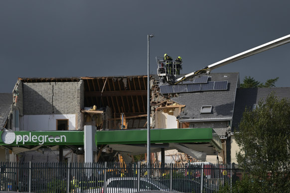 Emergency services work at the scene of an explosion at Applegreen service station in the village of Creeslough, in County Donegal, Ireland, on Saturday.