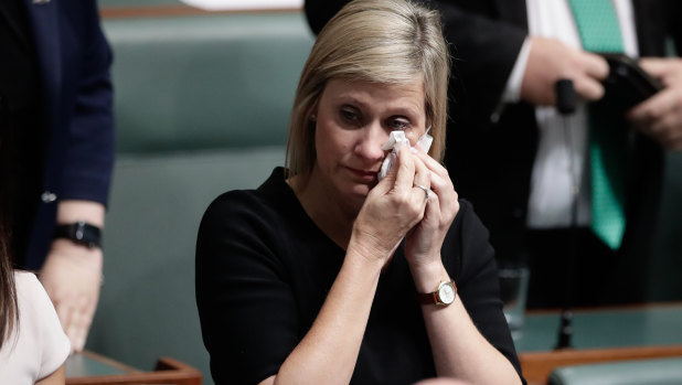 Labor MP Susan Lamb wipes away tears after delivering a statement on her citizenship in Parliament on Wednesday.