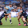 Waratahs drop four straight as Rebels power home late in game