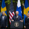 US President Joe Biden speaks as Sauli Niinisto, Finland’s president, left, and Magdalena Andersson, Sweden’s prime minister, right, listen during a news conference in the Rose Garden of the White House.