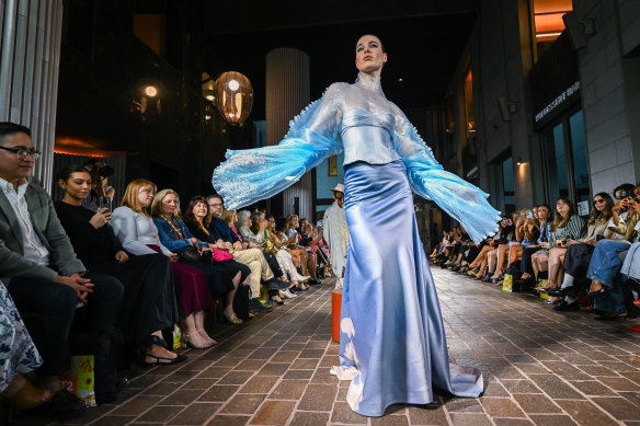 A model walks the runway at the launch of Melbourne Fashion Week on Monday. 