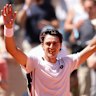 Adam Walton celebrates his victory over Daniil Medvedev.