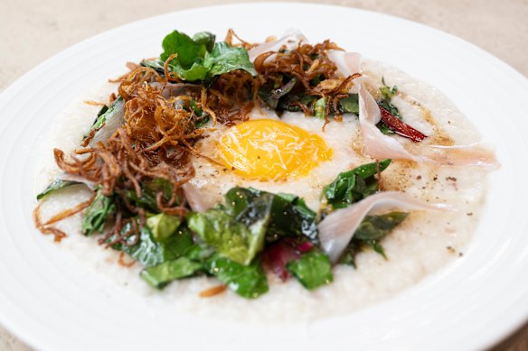 Rice congee with hen's egg and crispy onion. 