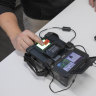 Matthias Marx, a security researcher at the Chaos Computer Club, uses a SEEK II to scan his fingerprint in Hamburg last week.