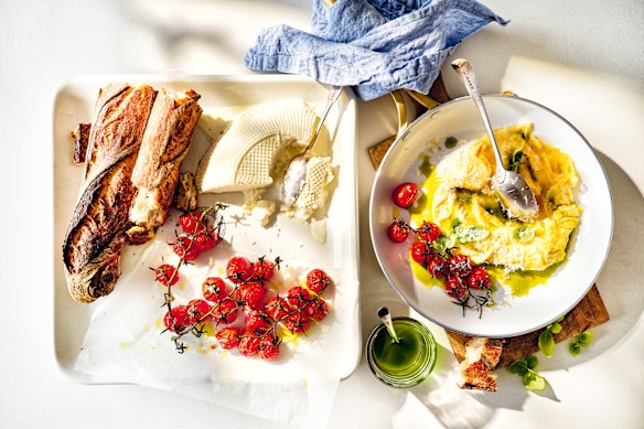 Basil oil brightens these soft and creamy ricotta eggs.