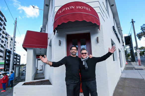 Jon Adgemis (left) of Public Hospitality Group with Guy Grossi outside the rebooted Clifton Hotel at Kew Junction.