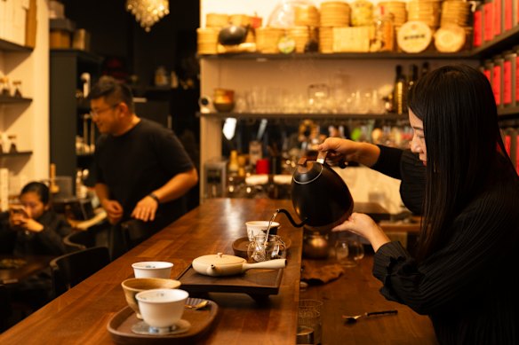 Cathy Zhang behind the counter at Ms Cattea Tea Bar.