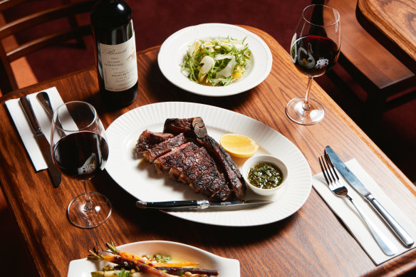 The Beehive’s club steak comes with salad, chips and a choice of sauces.