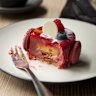 The Goya, a raspberry mousse encasing passionfruit cremeux, nougatine and almong sponge.