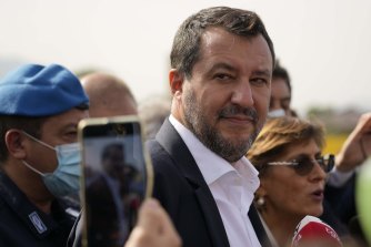 Former minister of interior Matteo Salvini and his lawyer Giulia Bongiorno talk to journalists outside court on Saturday.