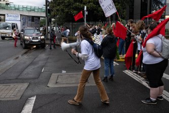 Students and staff picket an entry to Sydney University.
