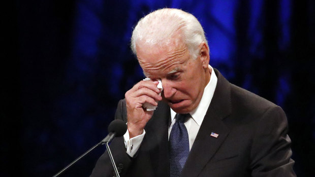 Former vice-president Joe Biden wipes a tear away while giving a tribute during memorial service at North Phoenix Baptist Church for Senator John McCain.
