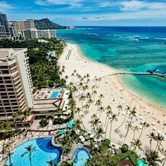 Aereal photo of Waikiki beach with view of Diamond Head mountain in the distance. iStock image for Traveller. Re-use permitted.