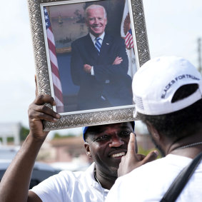 Supporters of Trump and Biden face off outside court in Fort Pierce, Florida.