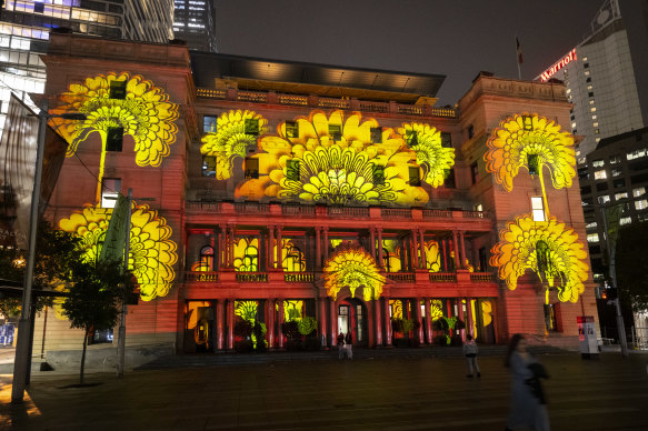 A print by Florence Broadhurst is projected onto the front of Customs House, which is part of Vivid’s Light Walk.