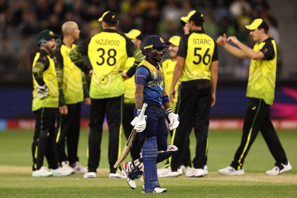 Pathum Nissanka of Sri Lanka walks from the field after being dismissed.